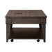 Arrowcreek Lift Top Cocktail Table in Weathered Stone - Gibson McDonald Furniture & Mattress 